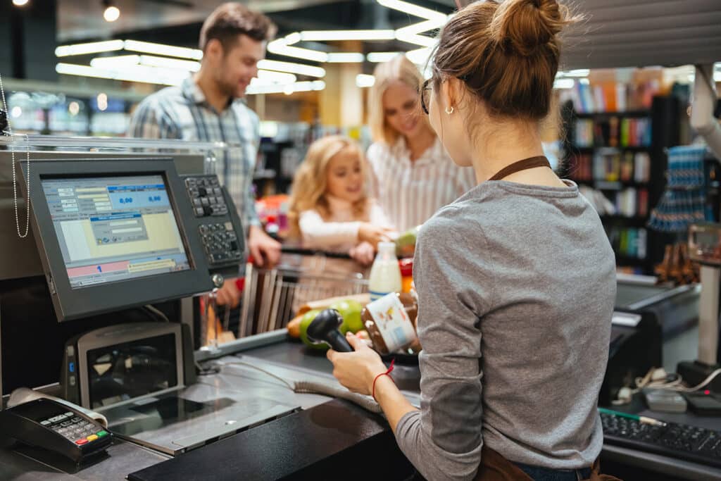 happy family shopping checkout